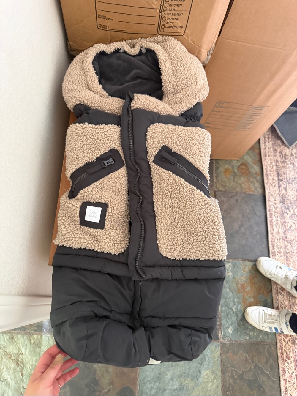 Cozy Sherpa-Lined Black & Cream Baby Bunting
